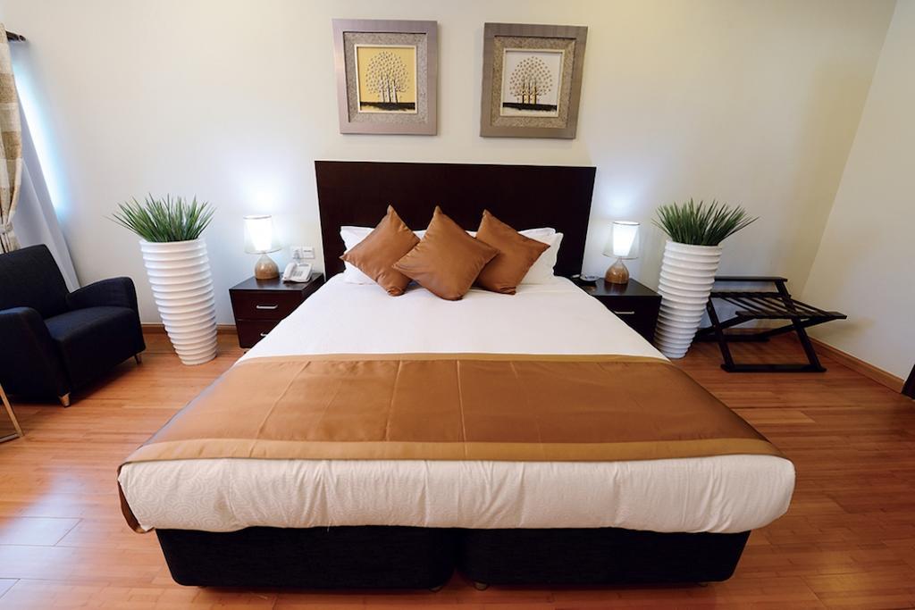 Timor Plaza Hotel & Apartments Ділі Номер фото