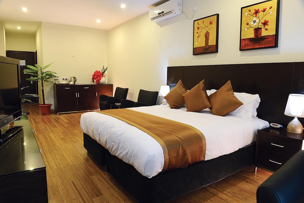 Timor Plaza Hotel & Apartments Ділі Номер фото