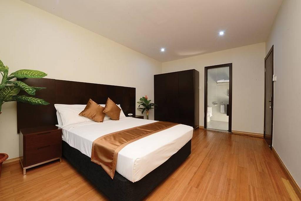 Timor Plaza Hotel & Apartments Ділі Номер фото